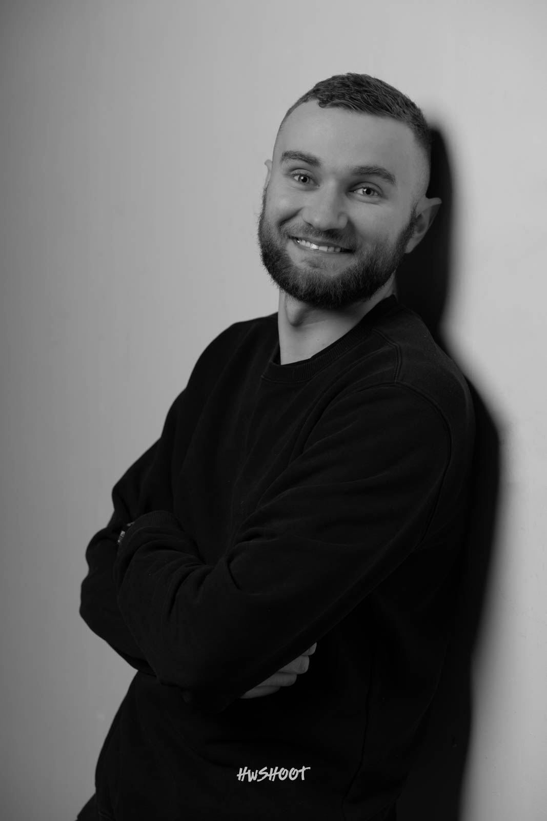 Black and white male portrait photography in Calgary with studio-style lighting