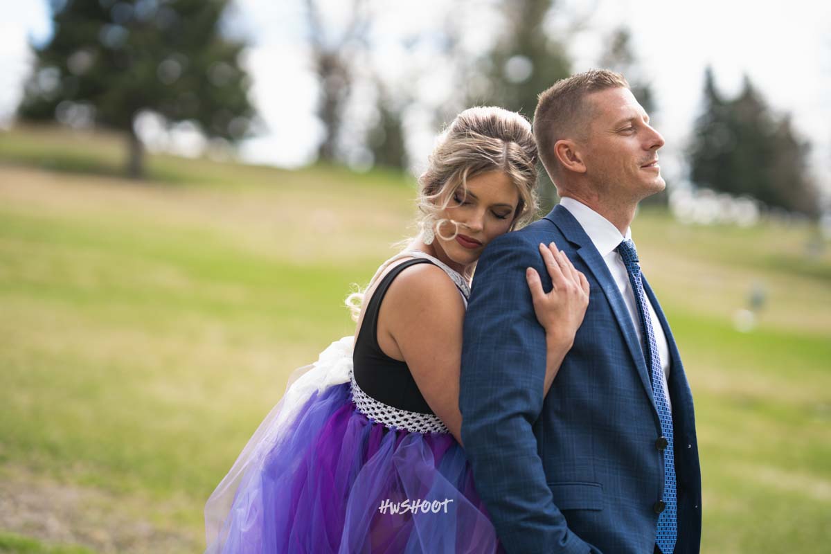 Wedding Photographer Calgary capturing an outdoor couple portrait